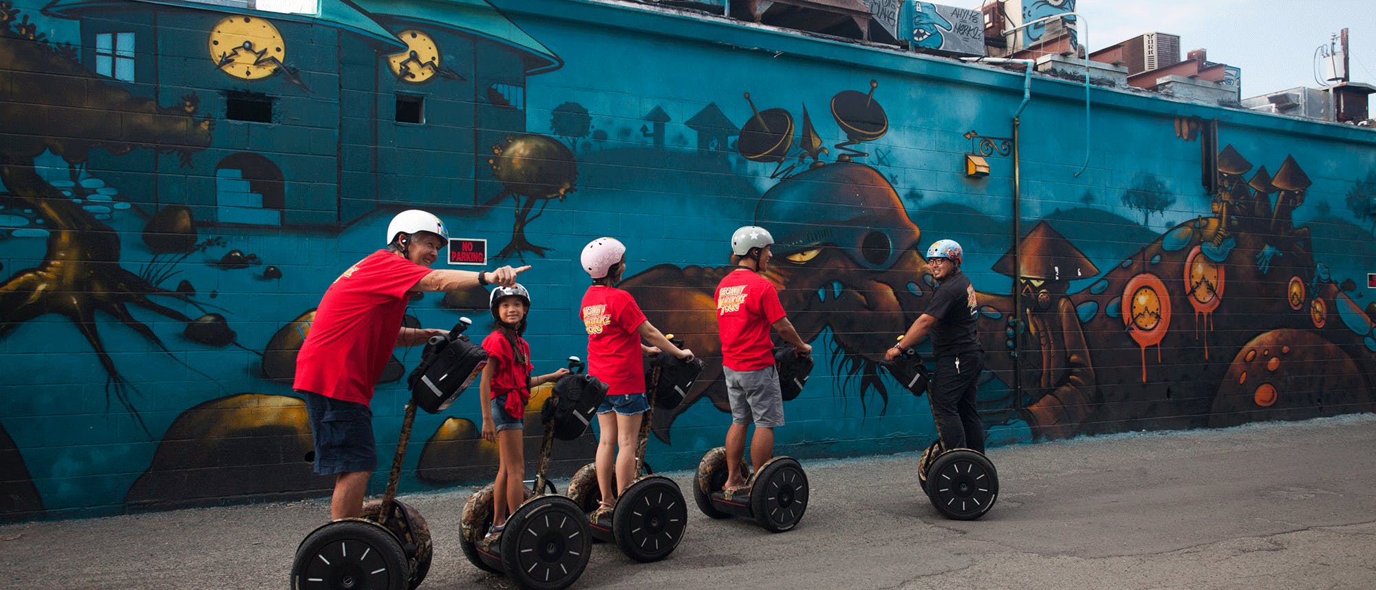 temp-5-of-1 a group of people riding on the back of a truck